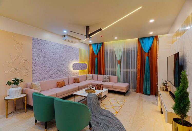 Modern living room with pastel sofa, colorful curtains, stylish lighting, and elegant decor.