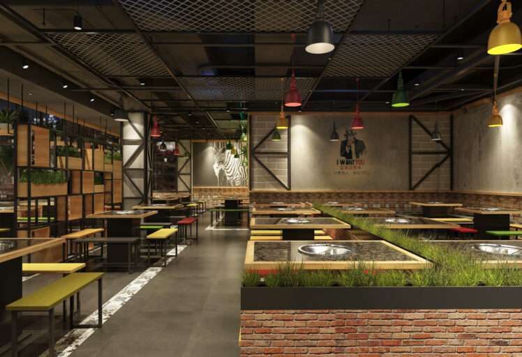 Modern industrial-style restaurant interior with brick walls, grill tables, and colorful seating.