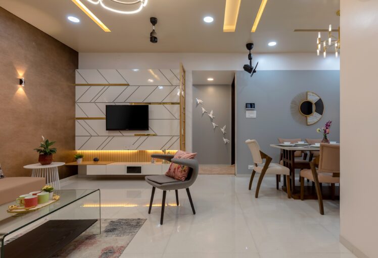 Cozy living room with neutral tones, comfortable seating, and modern decor accents.