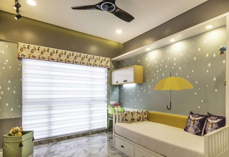 Playful kids' room interior design with umbrella wall art, cozy seating, and soft ambient lighting.